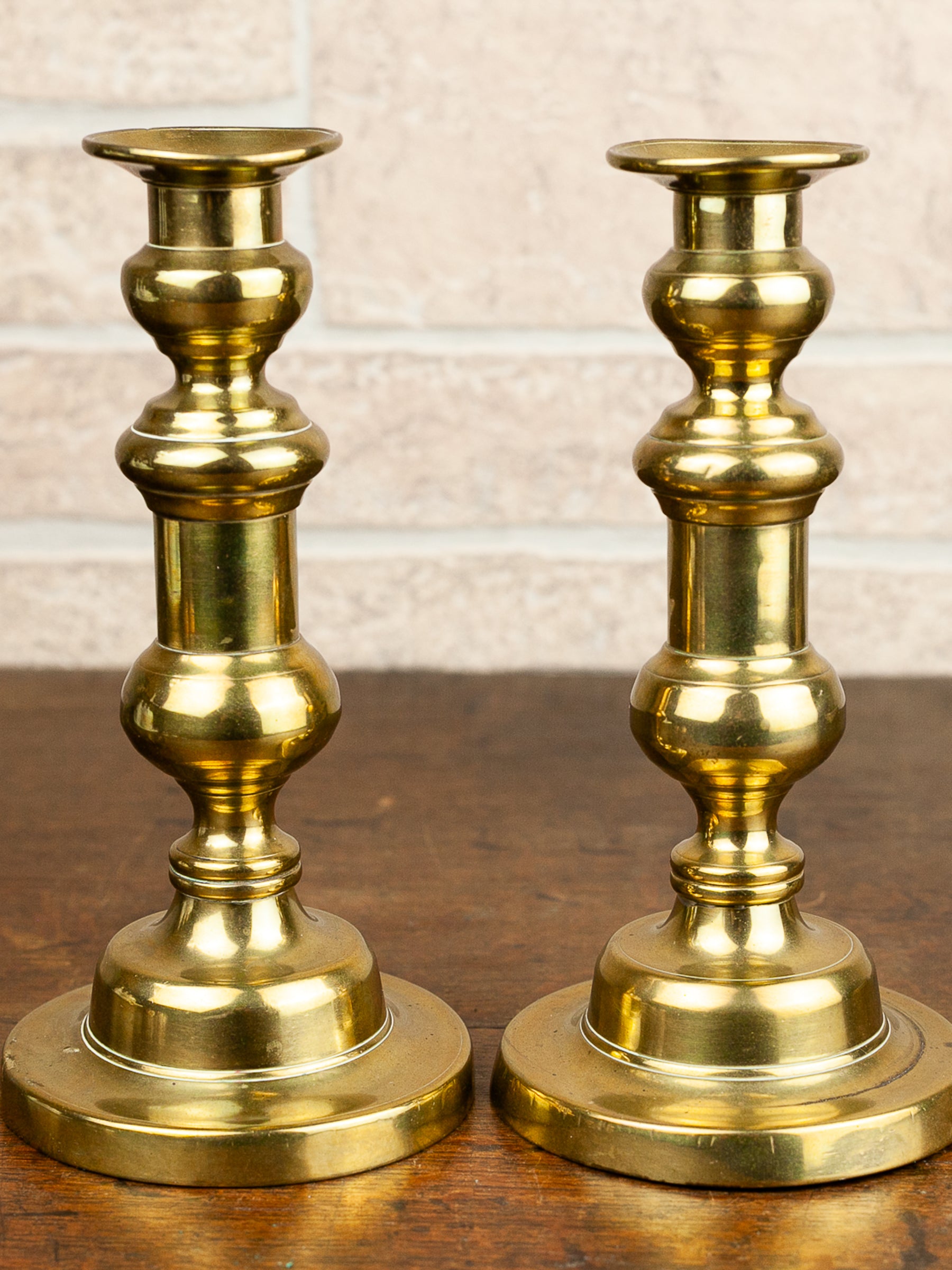 Pair of 19th Century English Brass Push-Up Candlesticks