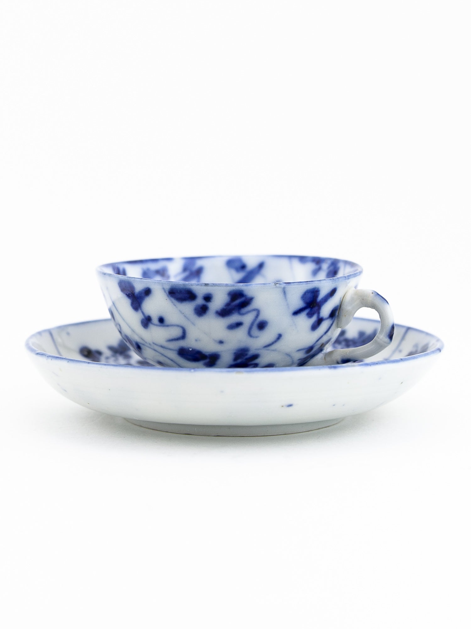 Chinese Qing Dynasty Blue & White Spiral Lotus Teacup & Saucer