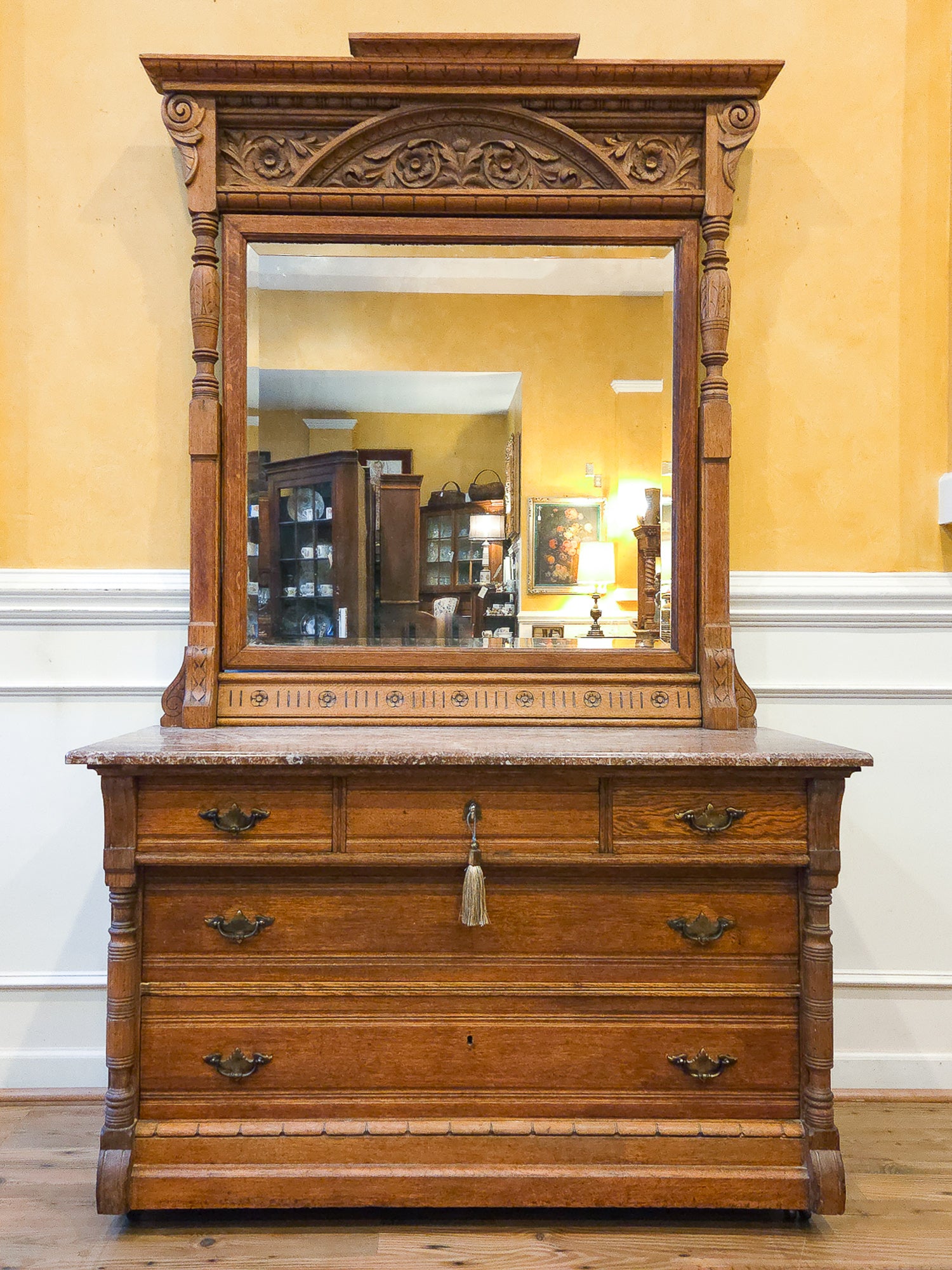Late 19th Century American Carved Oak Dresser with Rose Marble & Swivel Mirror
