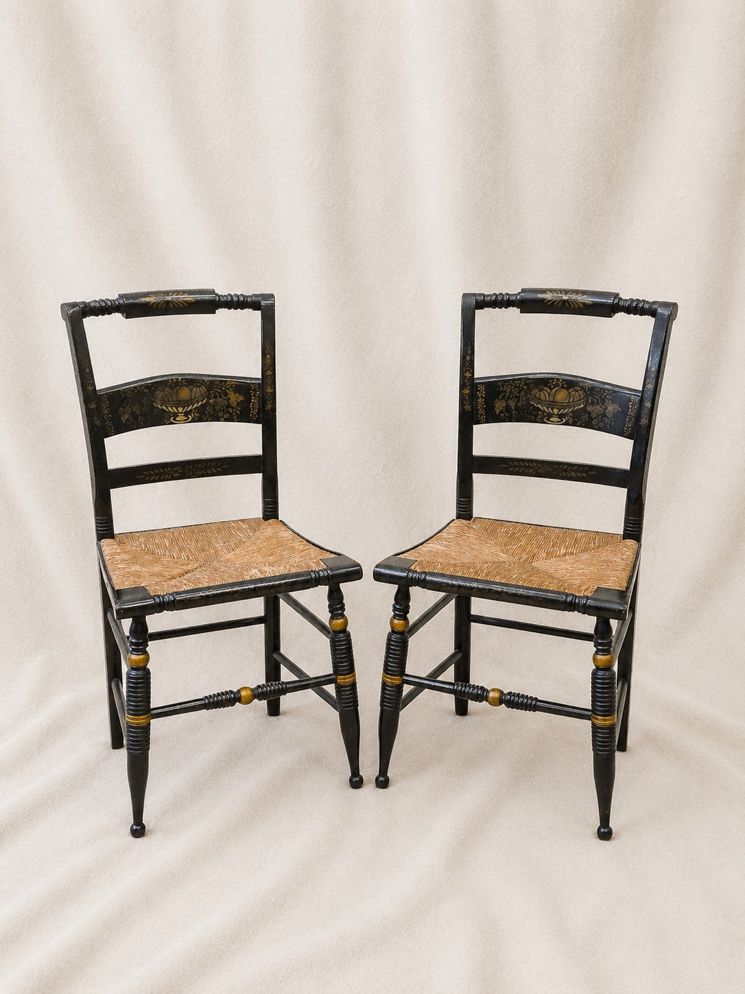 Pair of Vintage Hitchcock Black Painted Stenciled Side Chairs with Rush Woven Seats