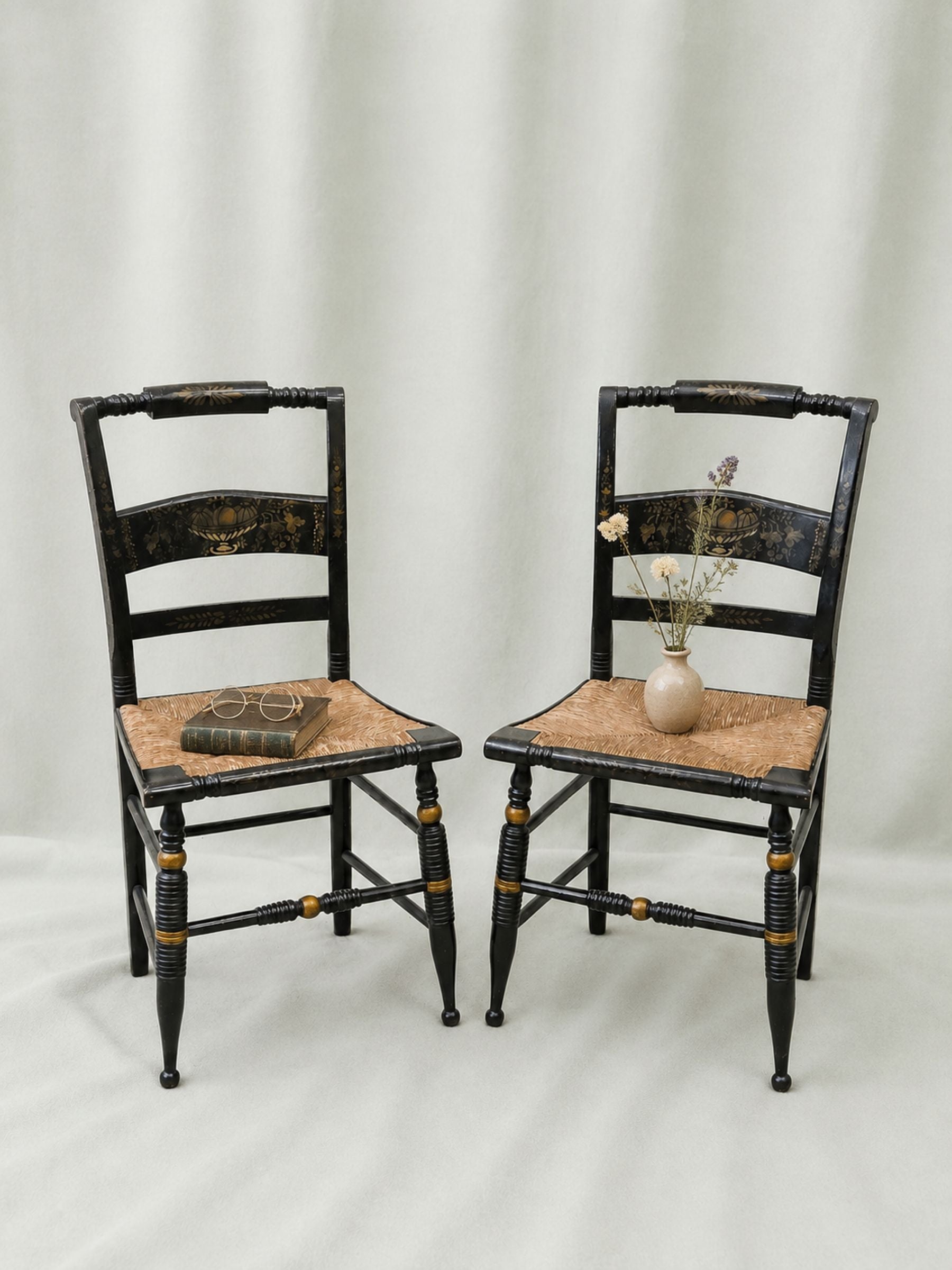 Pair of Vintage Hitchcock Black Painted Stenciled Side Chairs with Rush Woven Seats