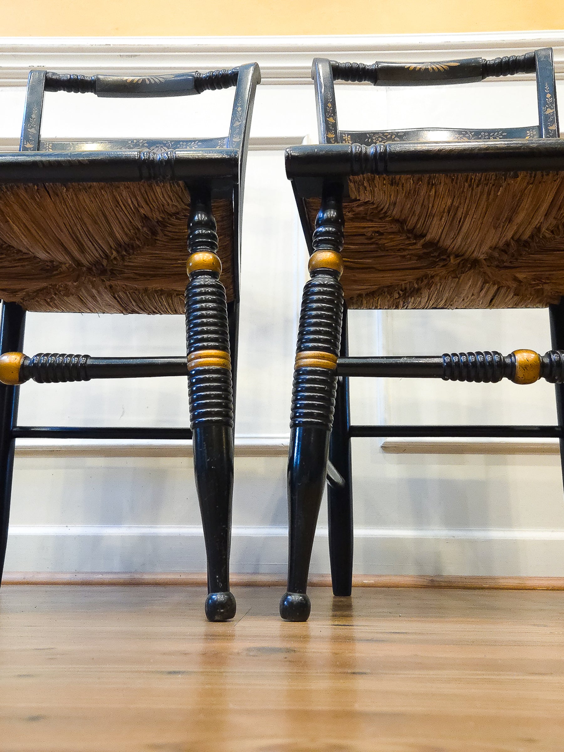 Pair of Vintage Hitchcock Black Painted Stenciled Side Chairs with Rush Woven Seats
