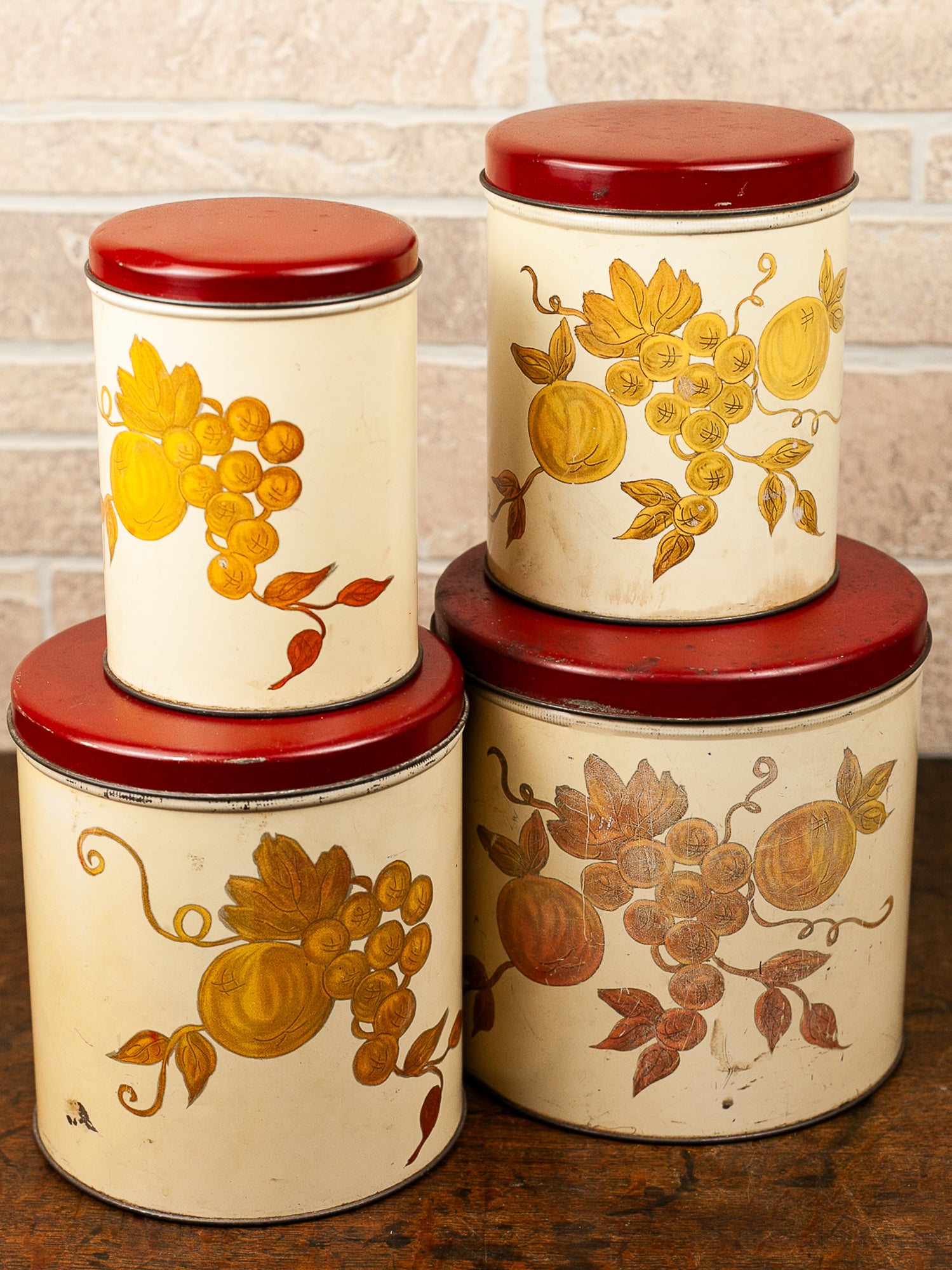 Set of Four Vintage Nesting Kitchen Canisters with Fruit Decoration