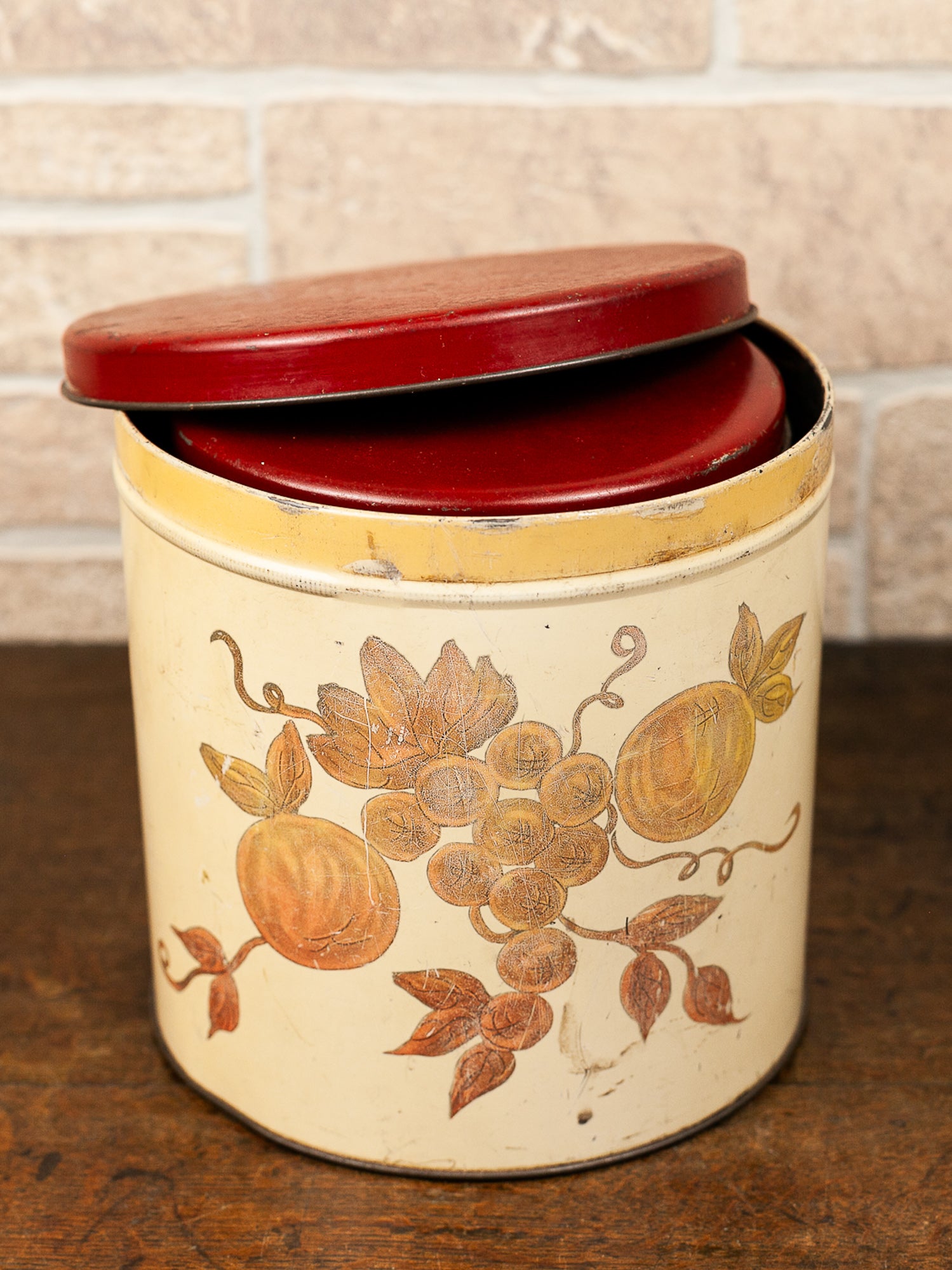 Set of Four Vintage Nesting Kitchen Canisters with Fruit Decoration