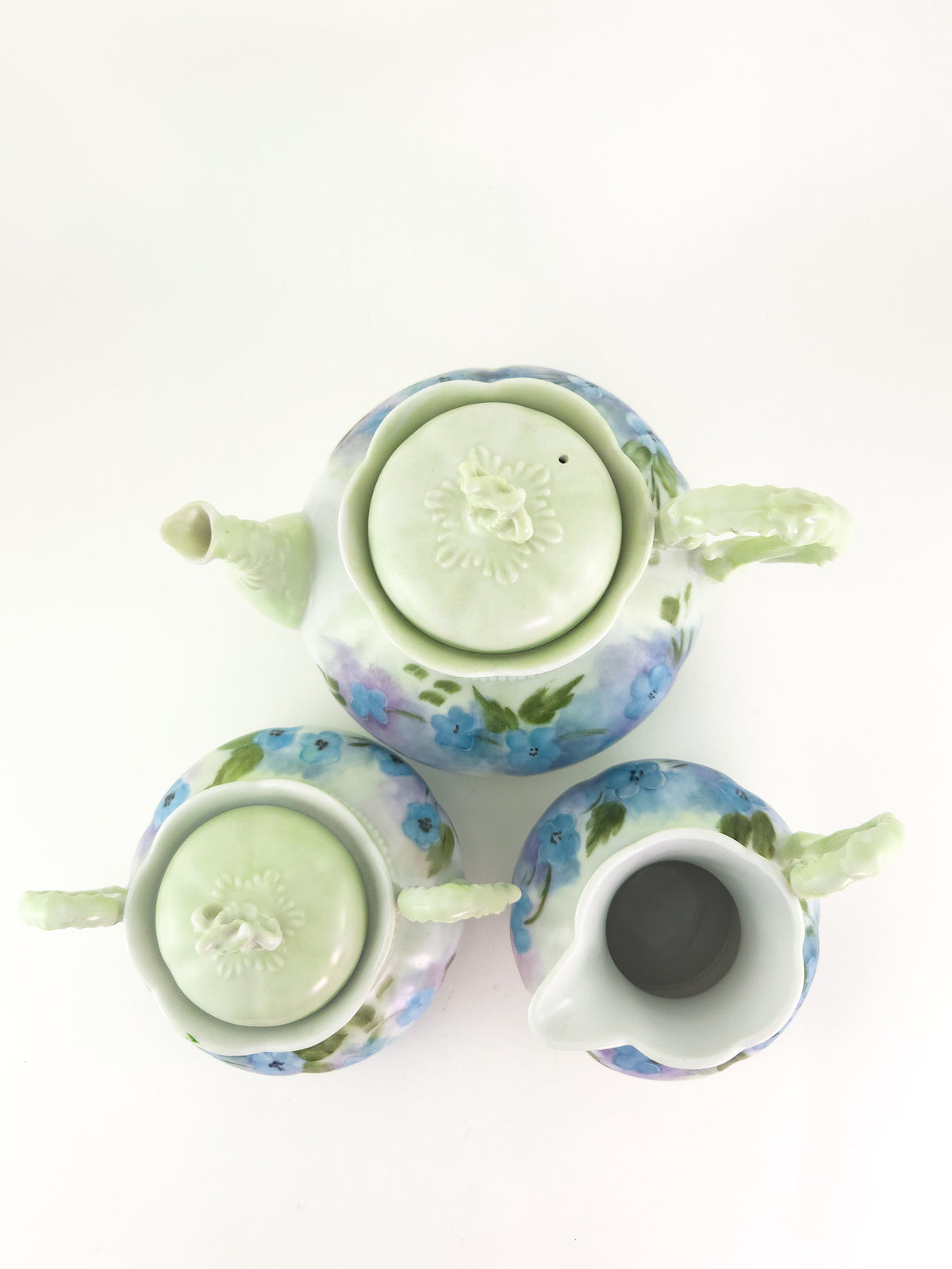 Hand-Painted Porcelain Three-Piece Tea Set with Floral Decoration