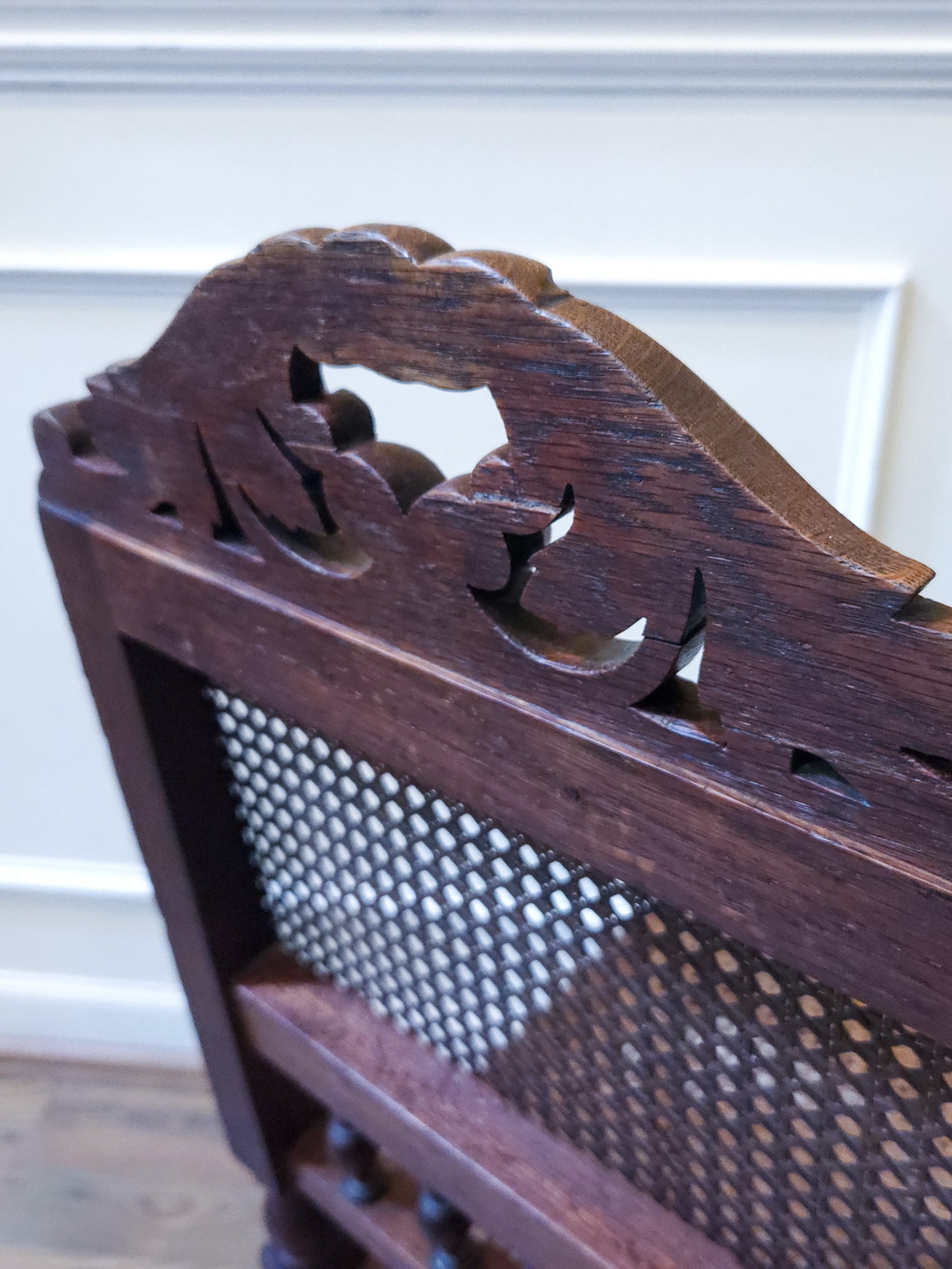 Pair of Antique French Carved Oak Chairs, Late 19th Century with Cane Seats and Backs.