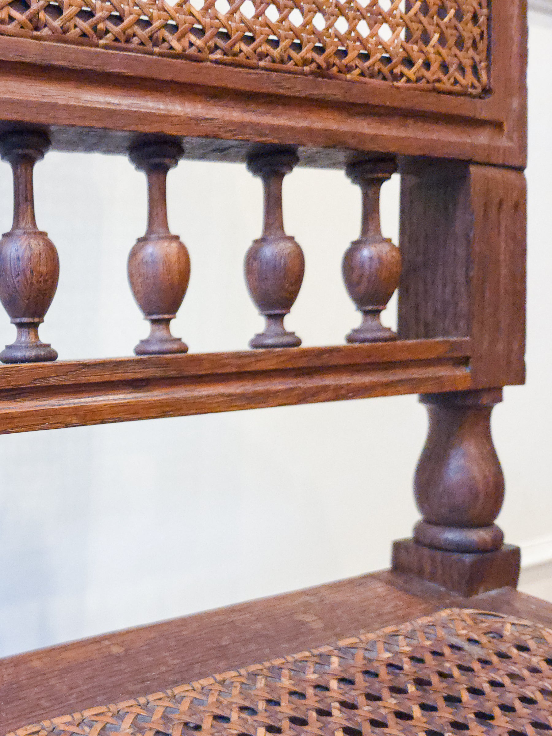 Pair of Antique French Carved Oak Chairs, Late 19th Century with Cane Seats and Backs.