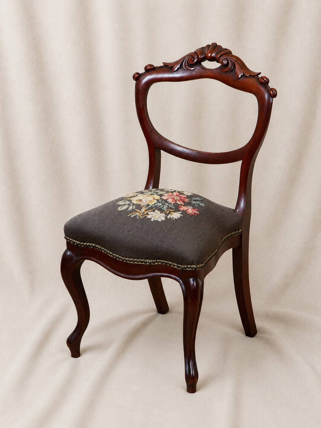 Antique Victorian Carved Walnut Side Chair With Needlepoint Seat.