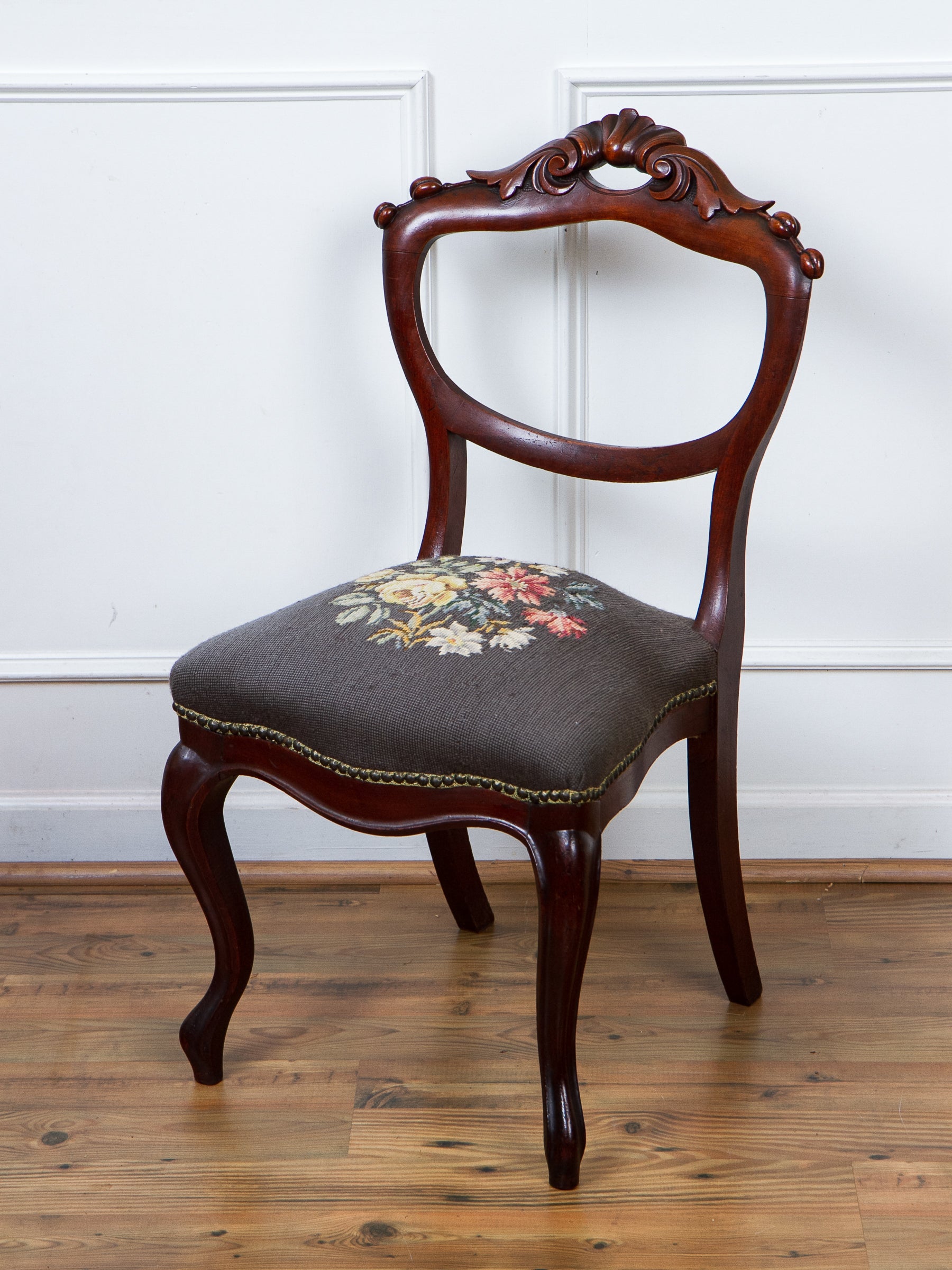 Antique Victorian Carved Walnut Side Chair With Needlepoint Seat.