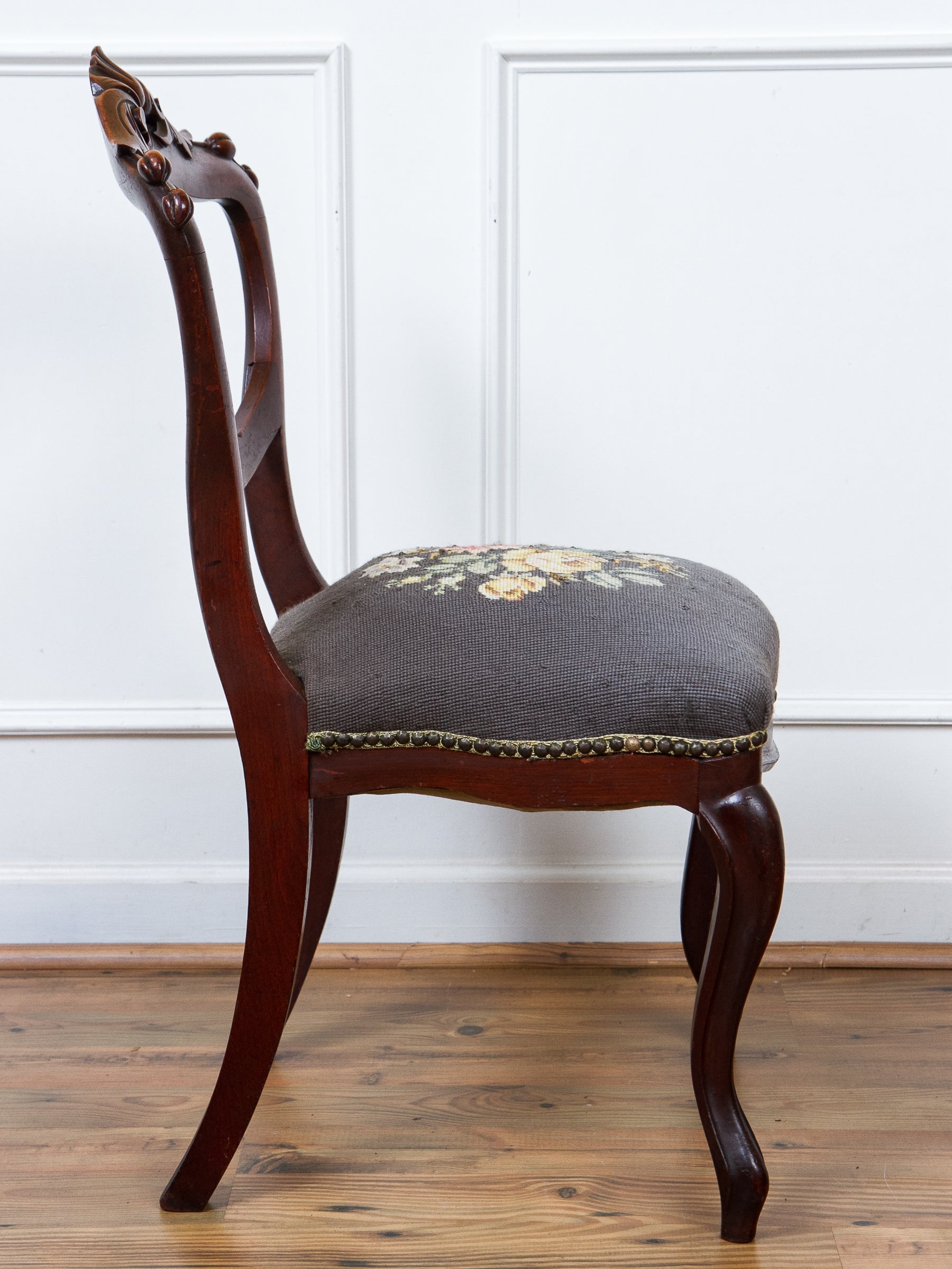 Antique Victorian Carved Walnut Side Chair With Needlepoint Seat.