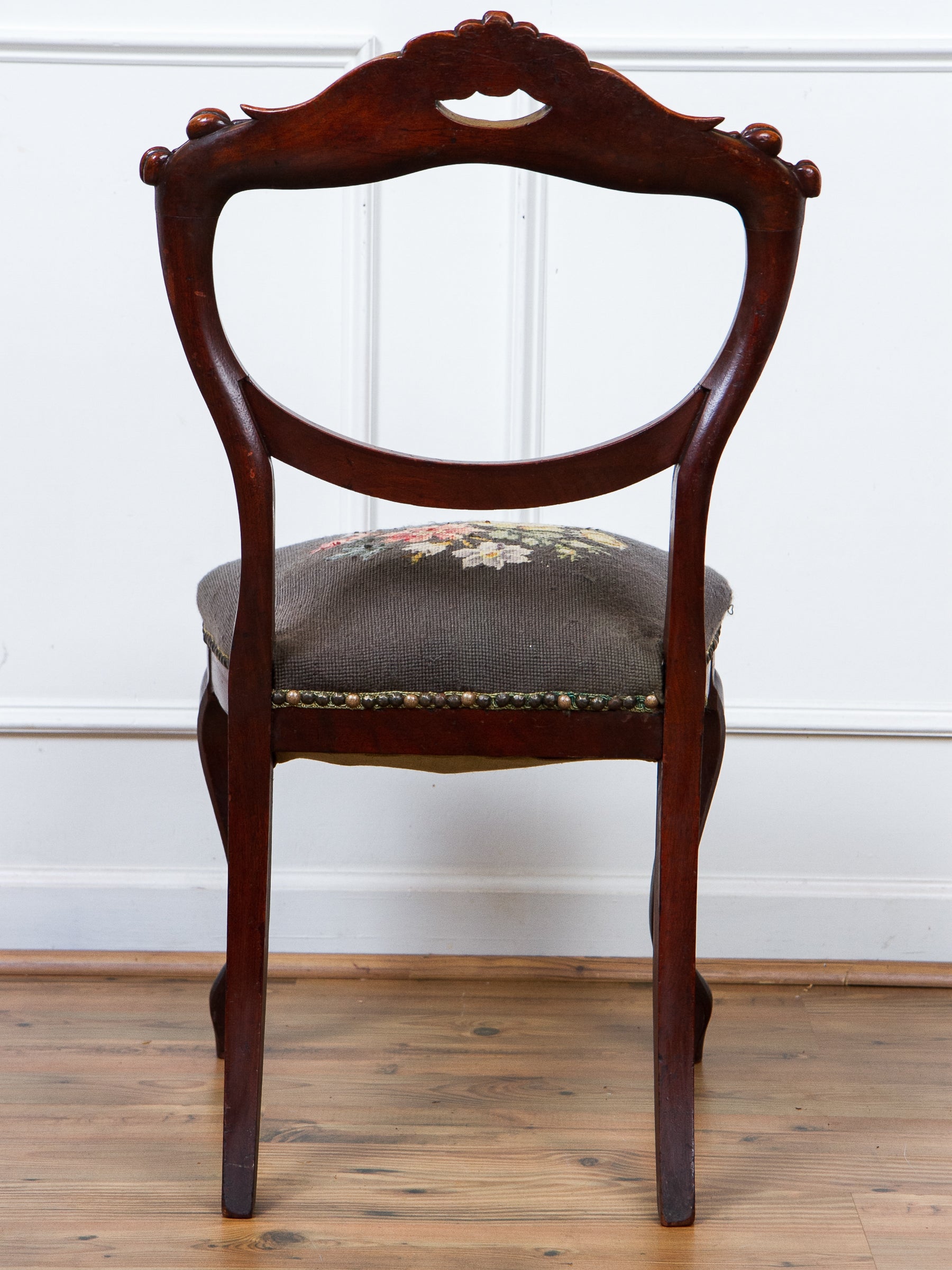 Antique Victorian Carved Walnut Side Chair With Needlepoint Seat.