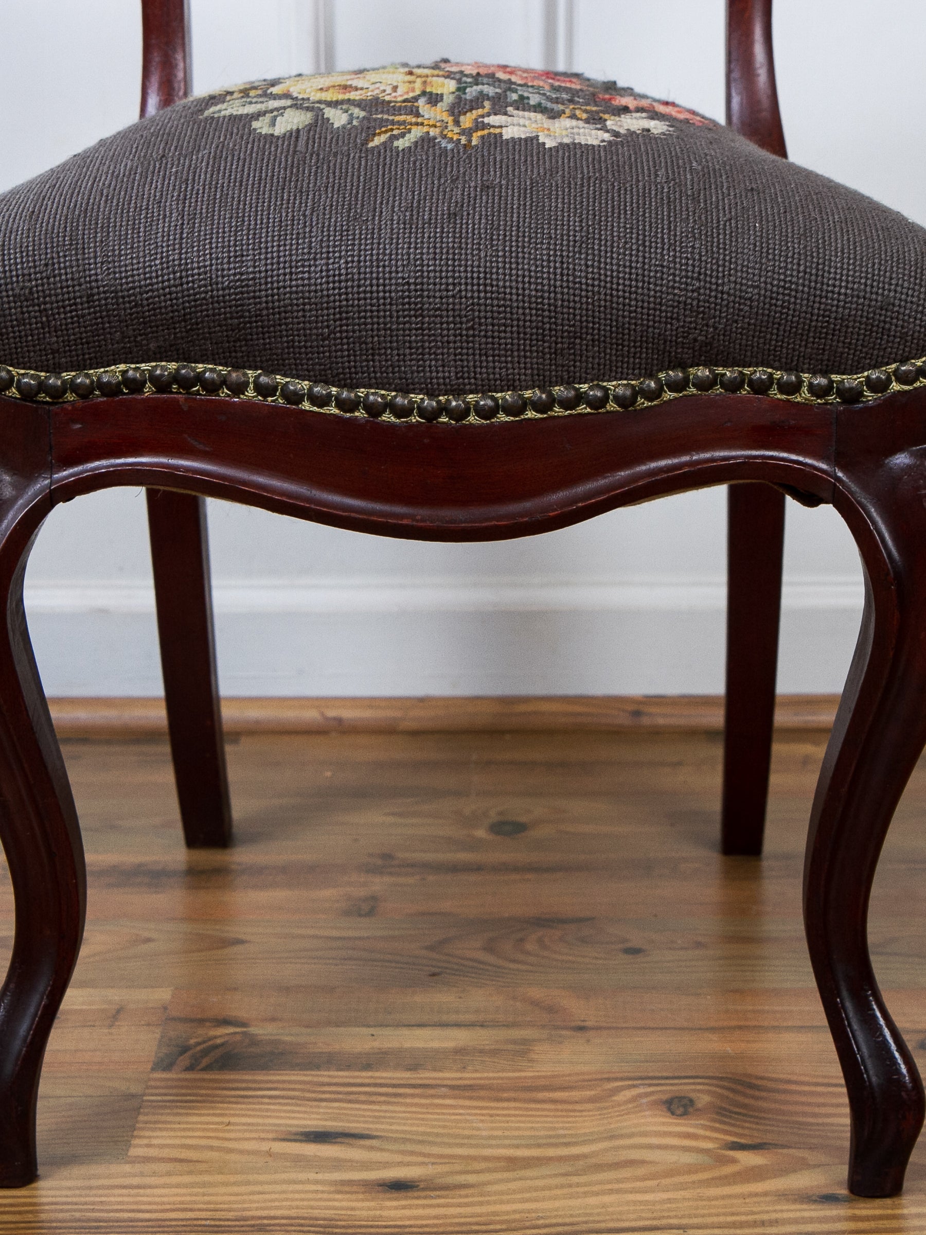 Antique Victorian Carved Walnut Side Chair With Needlepoint Seat.