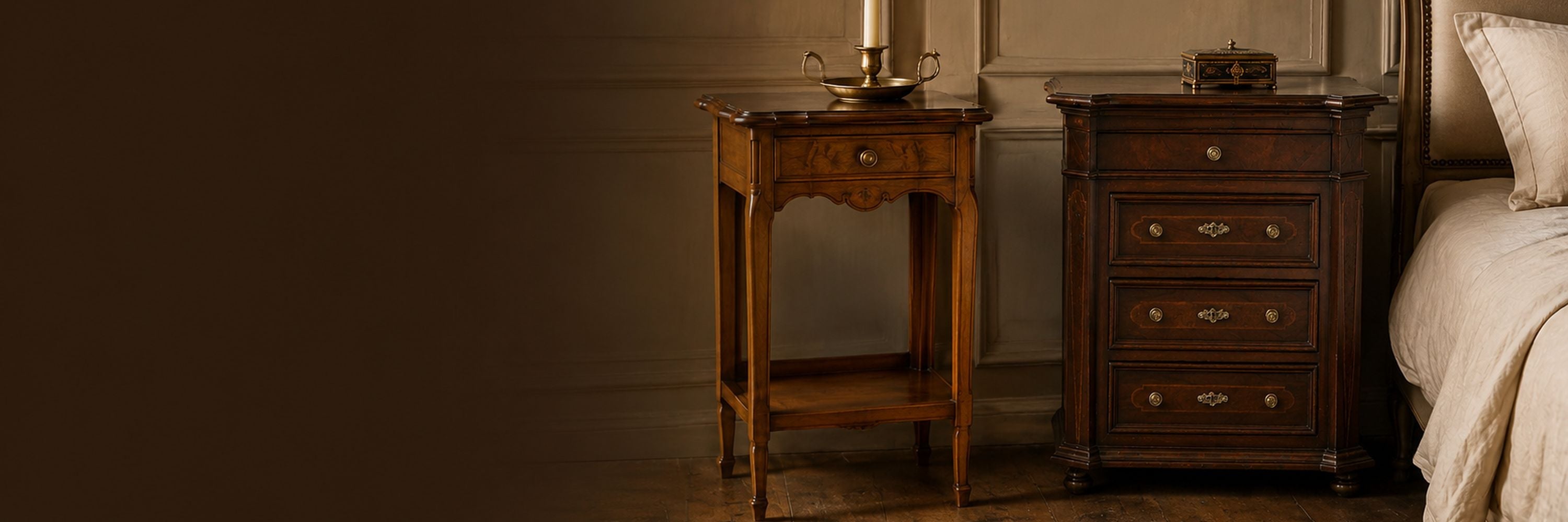 Dark walnut bedside chest and lighter open-shelf nightstand displayed beside an upholstered bed.