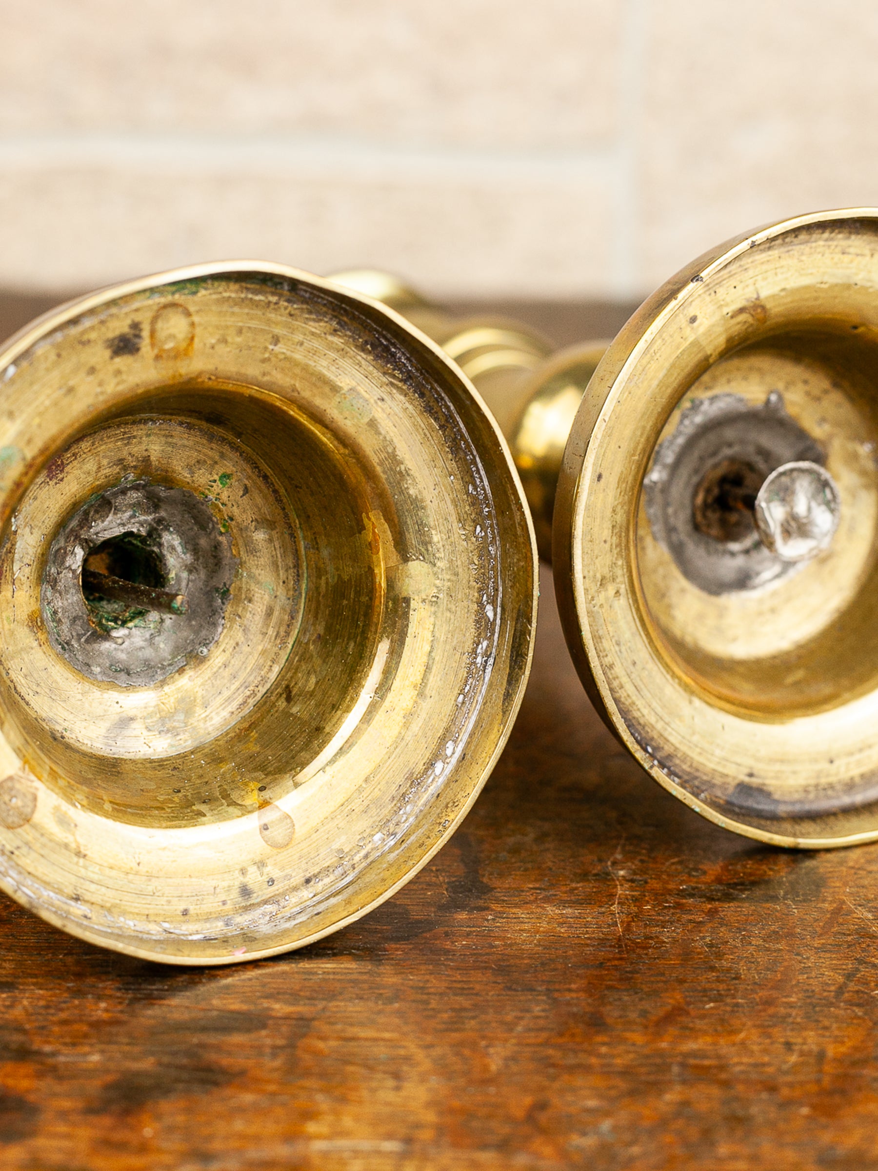 Pair of 19th Century English Brass Push-Up Candlesticks