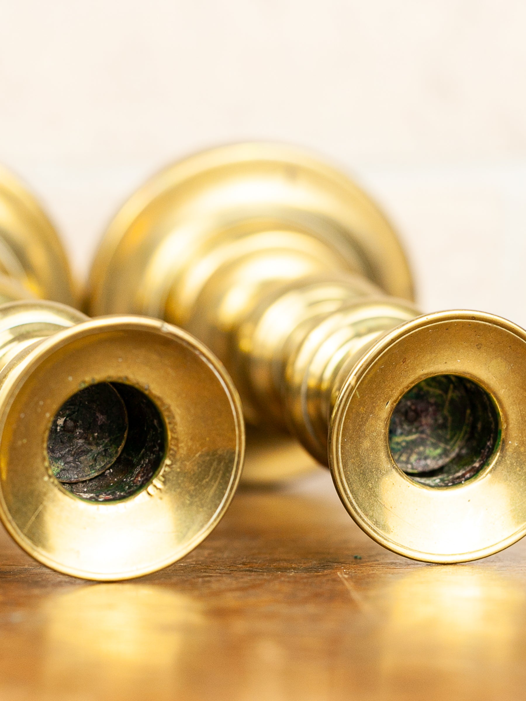 Pair of 19th Century English Brass Push-Up Candlesticks