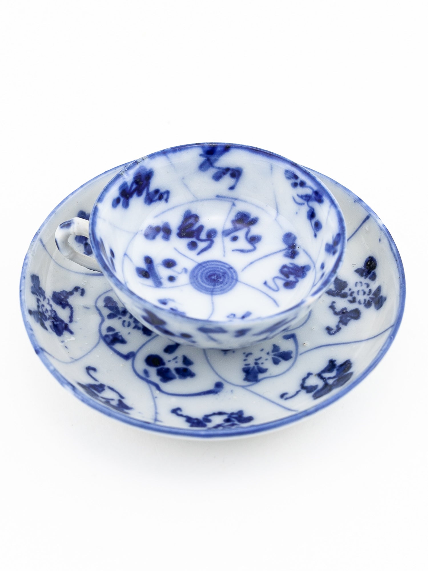 Chinese Qing Dynasty Blue & White Spiral Lotus Teacup & Saucer