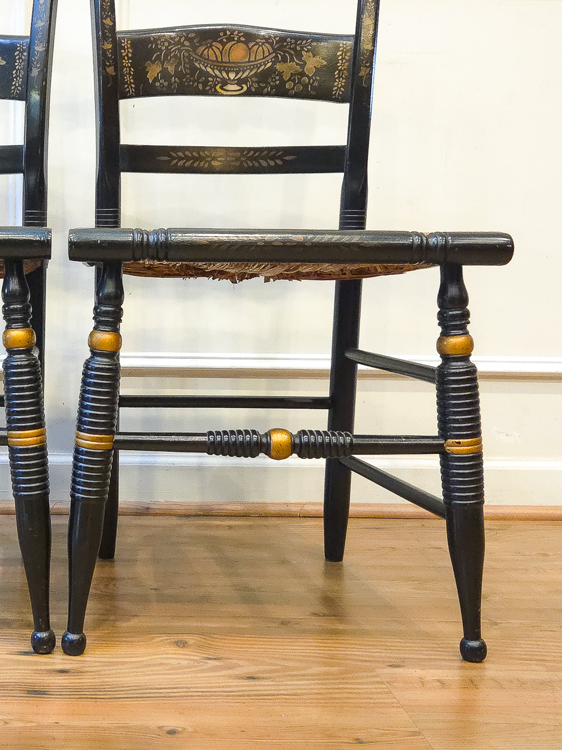 Pair of Vintage Hitchcock Black Painted Stenciled Side Chairs with Rush Woven Seats