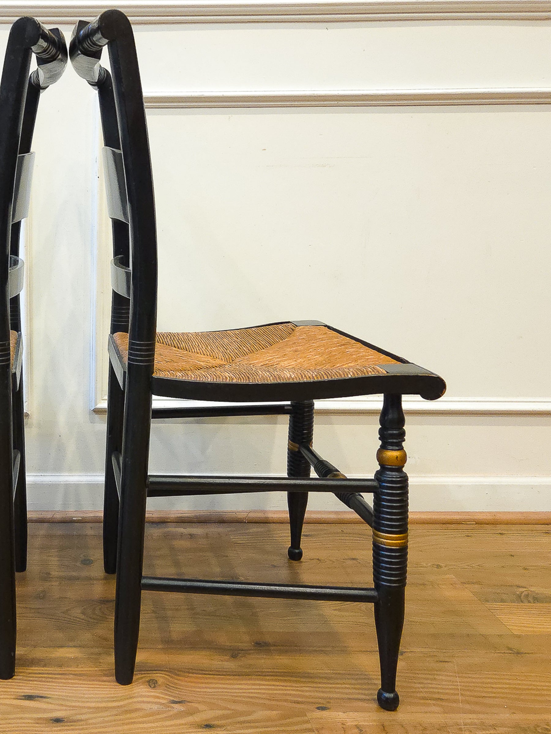 Pair of Vintage Hitchcock Black Painted Stenciled Side Chairs with Rush Woven Seats
