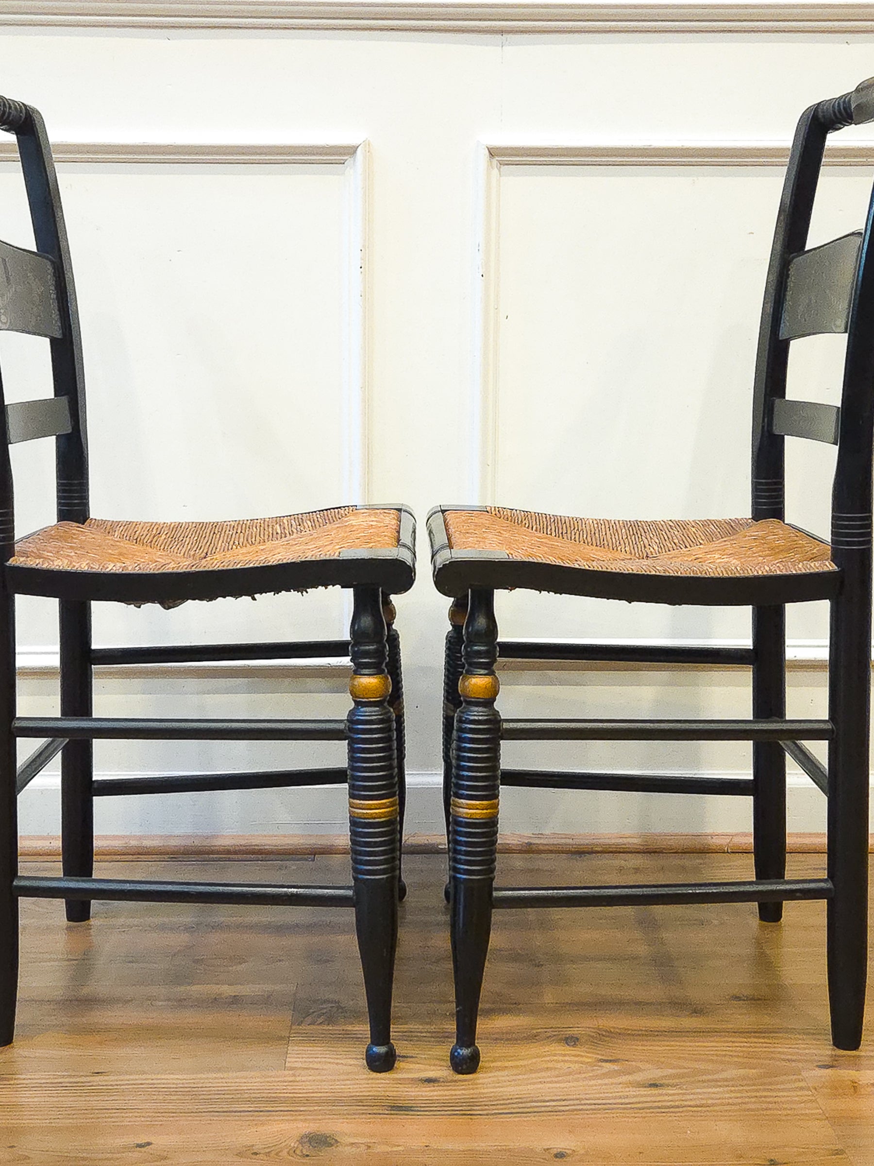 Pair of Vintage Hitchcock Black Painted Stenciled Side Chairs with Rush Woven Seats