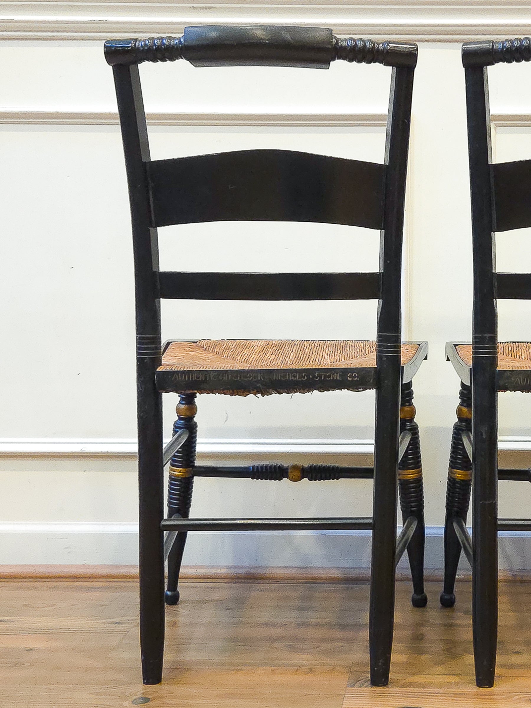 Pair of Vintage Hitchcock Black Painted Stenciled Side Chairs with Rush Woven Seats