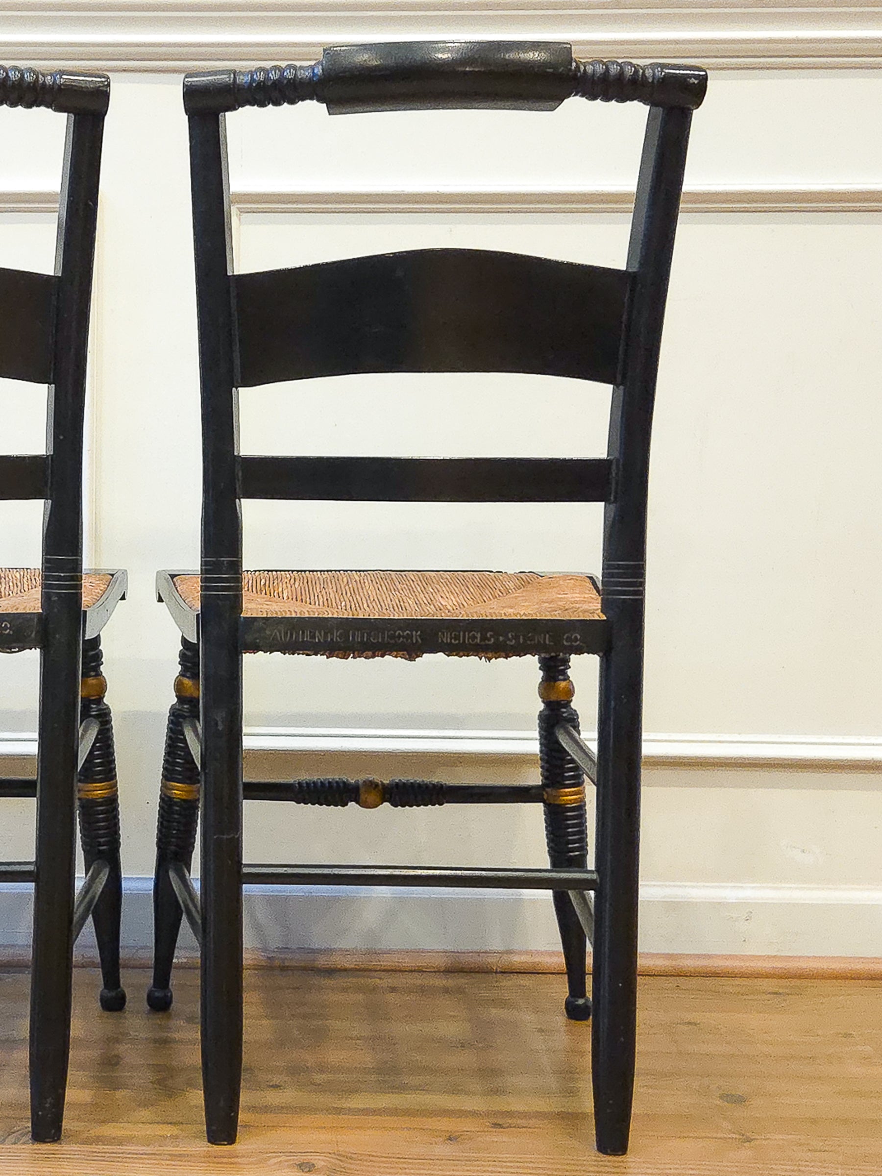 Pair of Vintage Hitchcock Black Painted Stenciled Side Chairs with Rush Woven Seats