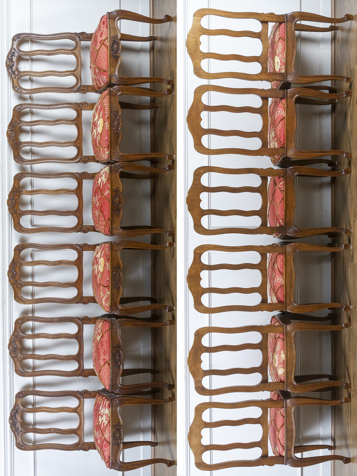 Two matching sets of vintage wooden chairs with curved brown frames and pink floral upholstered seats, arranged side-by-side against a white paneled wall.