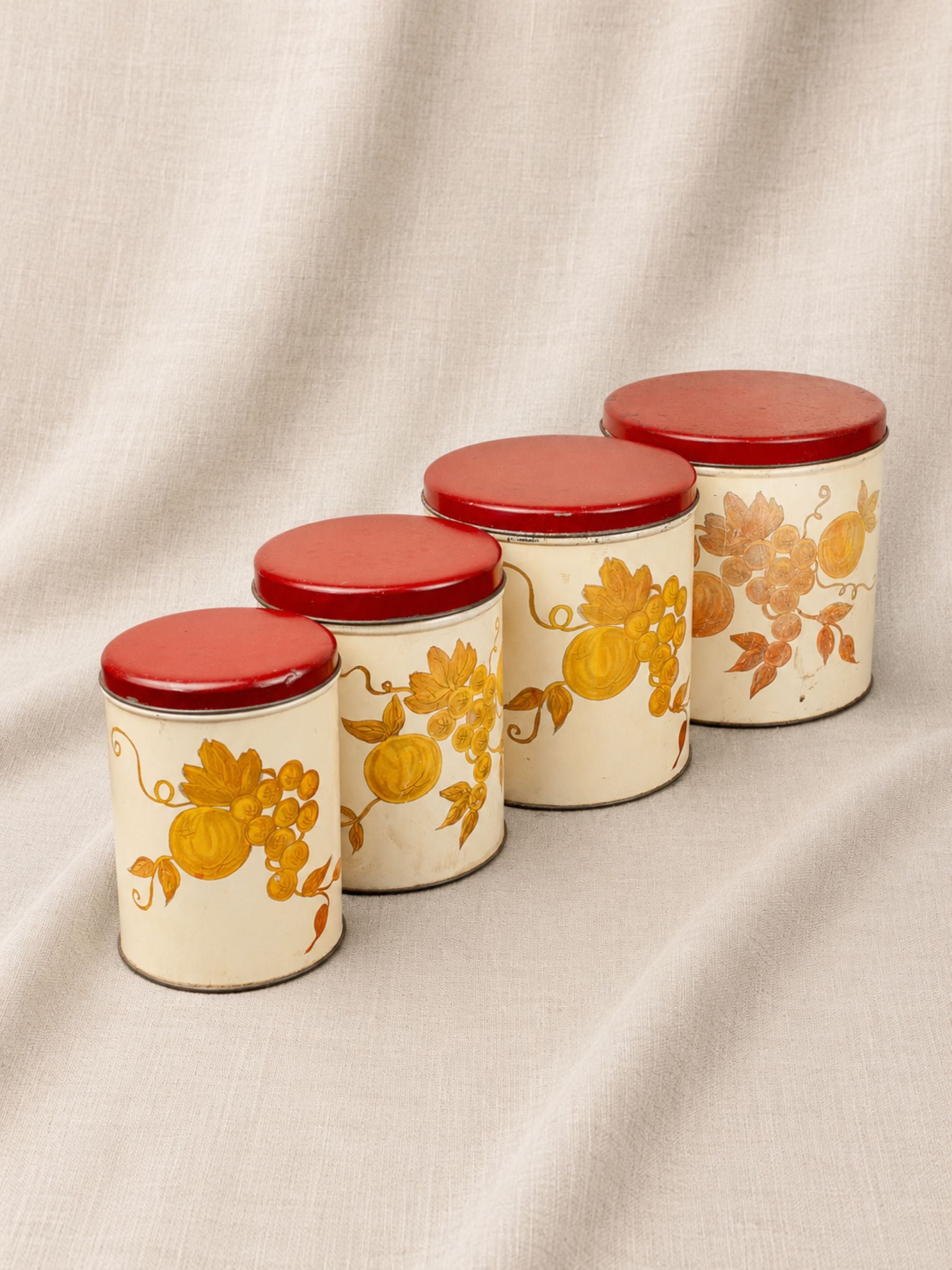 Set of Four Vintage Nesting Kitchen Canisters with Fruit Decoration