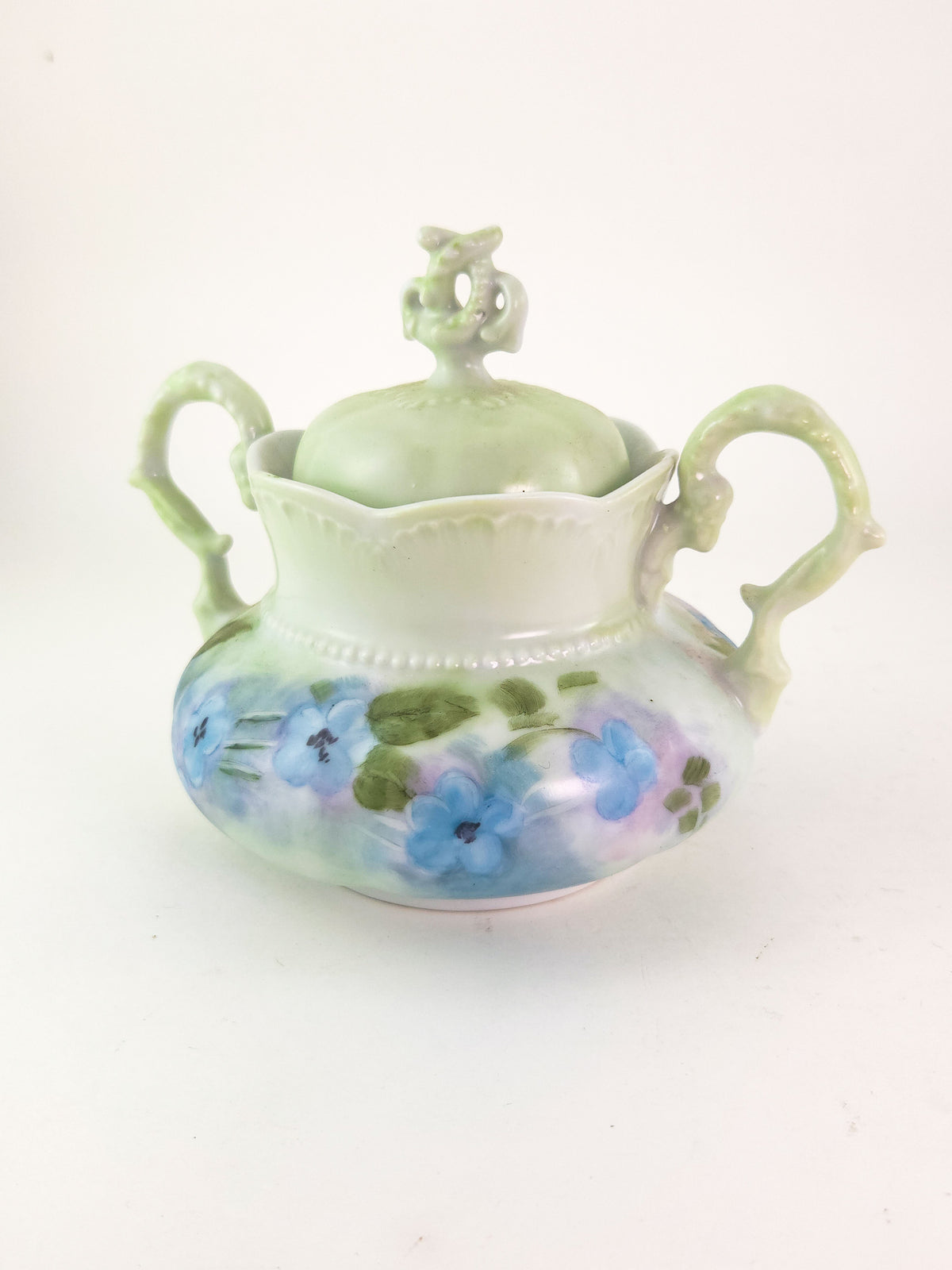 Hand-Painted Porcelain Three-Piece Tea Set with Floral Decoration