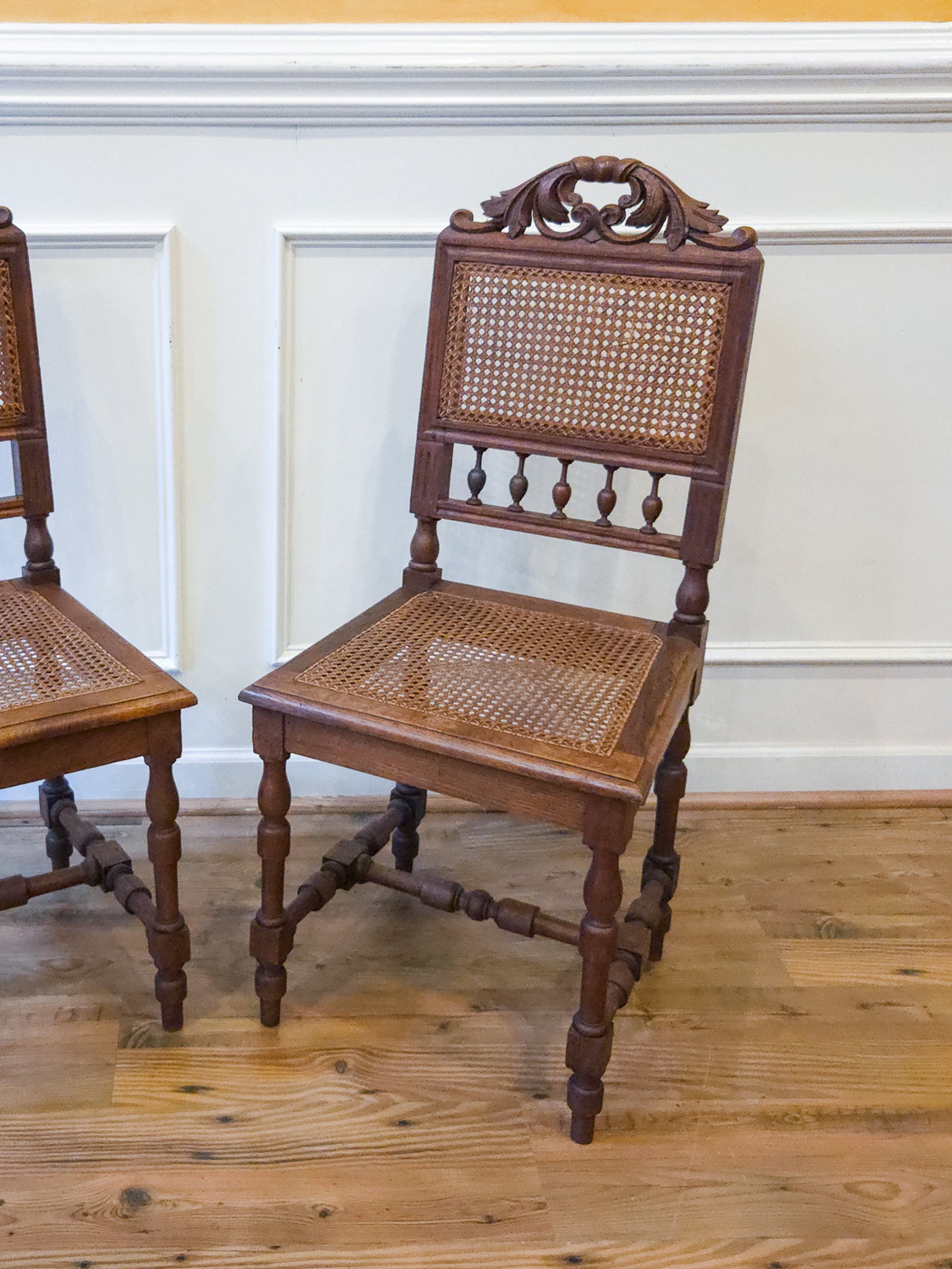 Pair of Antique French Carved Oak Chairs, Late 19th Century with Cane Seats and Backs.