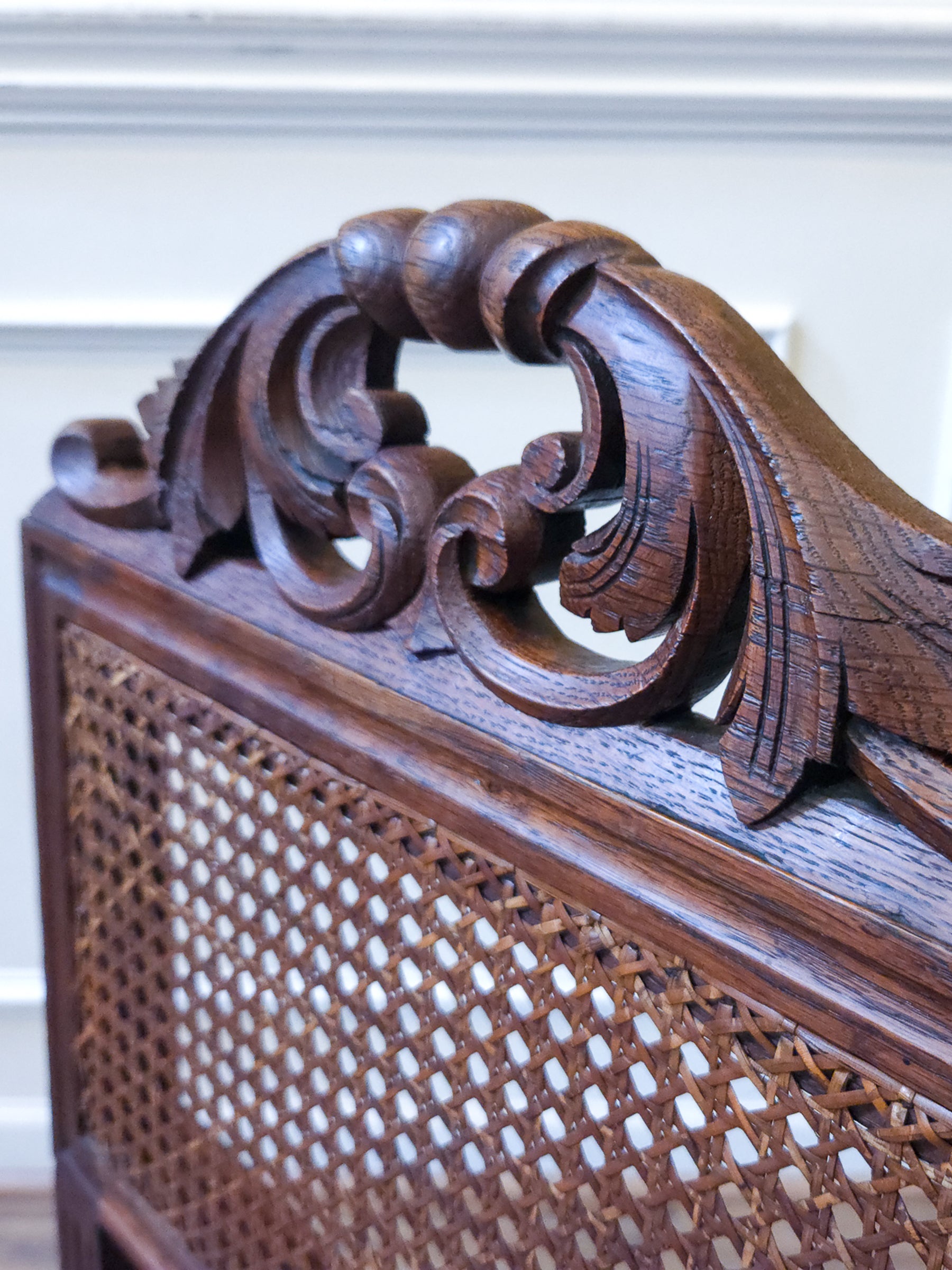Pair of Antique French Carved Oak Chairs, Late 19th Century with Cane Seats and Backs.