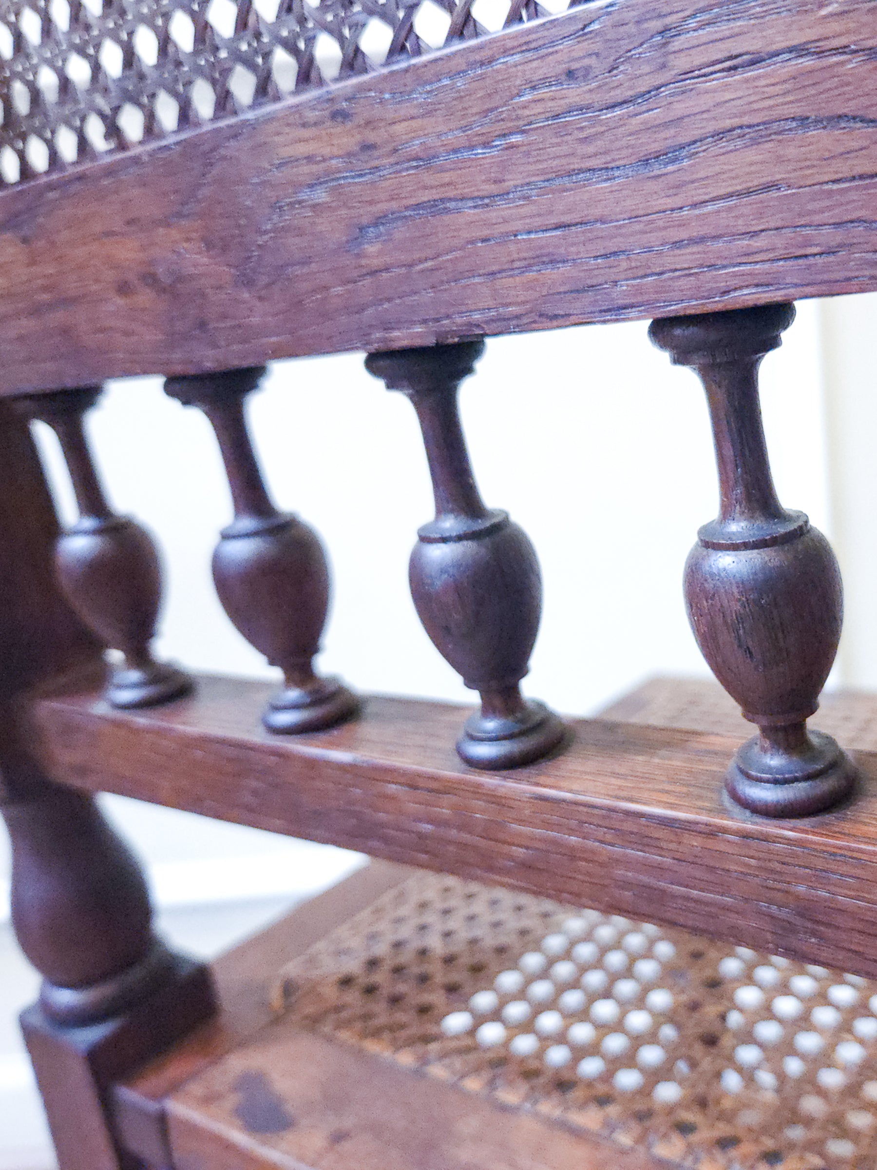 Pair of Antique French Carved Oak Chairs, Late 19th Century with Cane Seats and Backs.