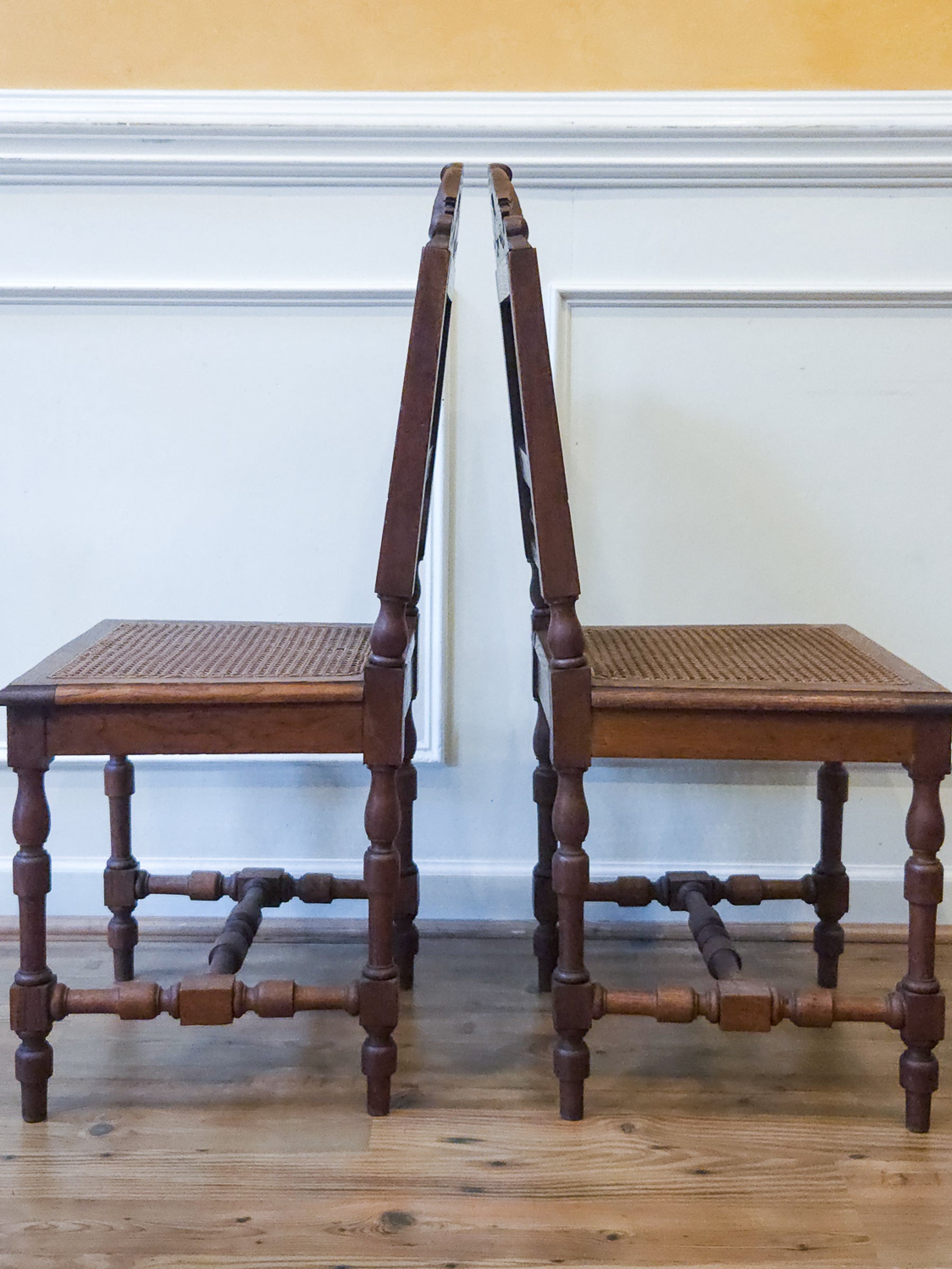 Pair of Antique French Carved Oak Chairs, Late 19th Century with Cane Seats and Backs.
