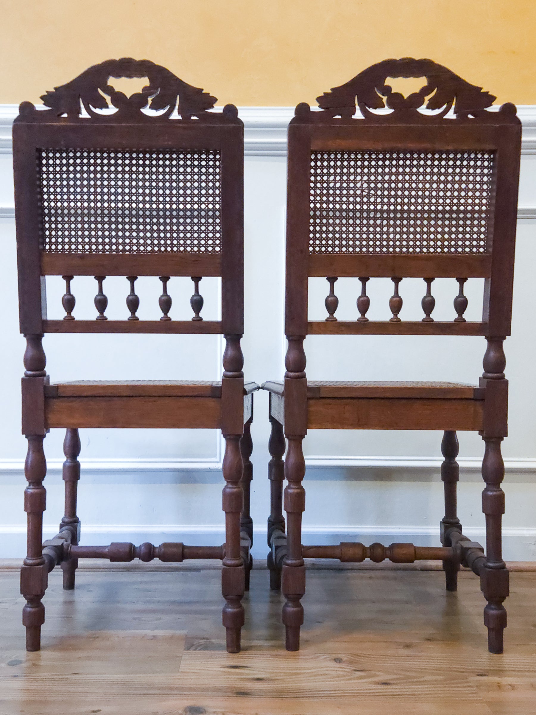 Pair of Antique French Carved Oak Chairs, Late 19th Century with Cane Seats and Backs.