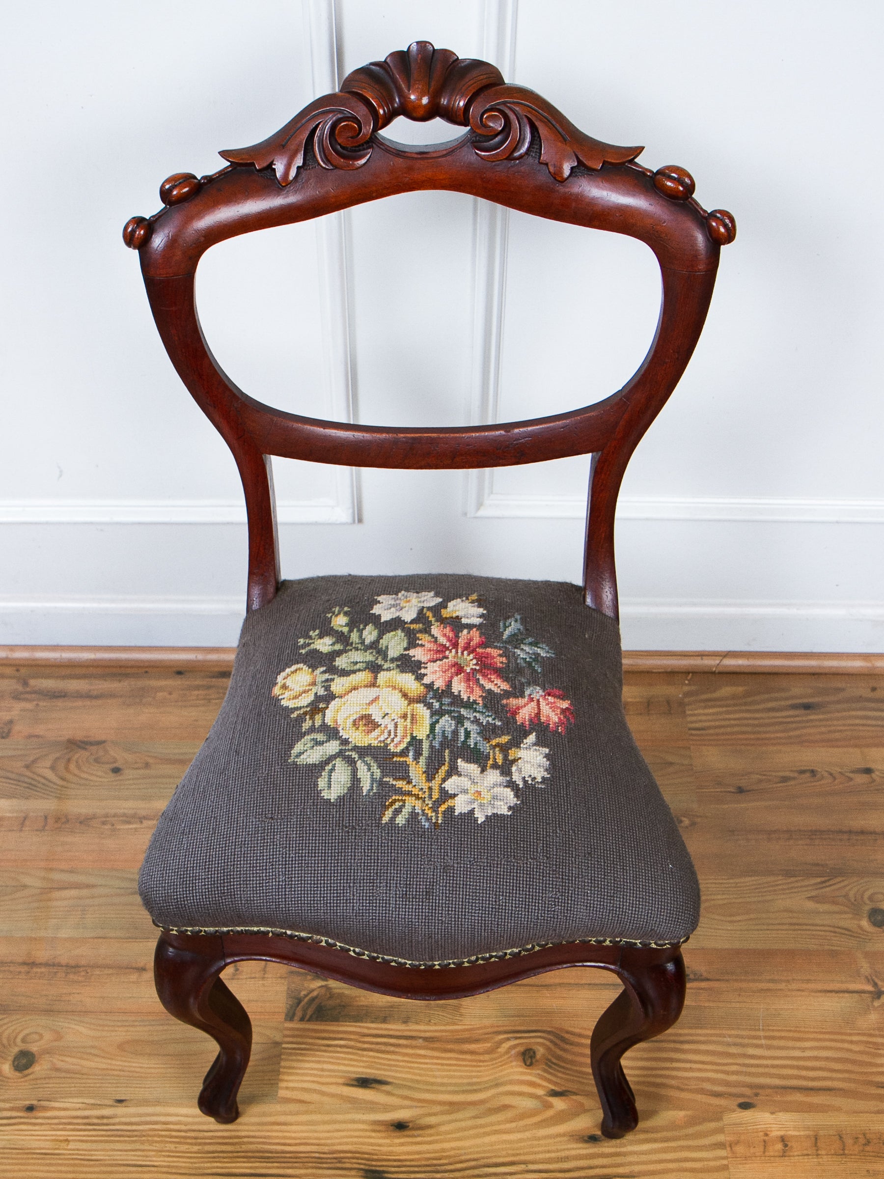 Antique Victorian Carved Walnut Side Chair With Needlepoint Seat.