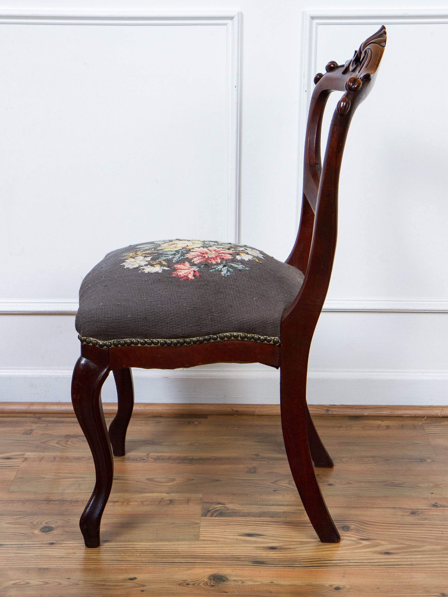 Antique Victorian Carved Walnut Side Chair With Needlepoint Seat.